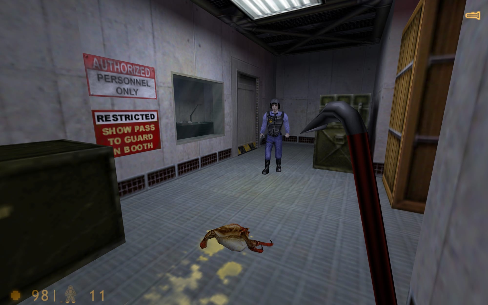 A screenshot of Half-Life: Uplink. Gordon is holding a Crowbar, in front of a security guard and a Headcrab he killed.