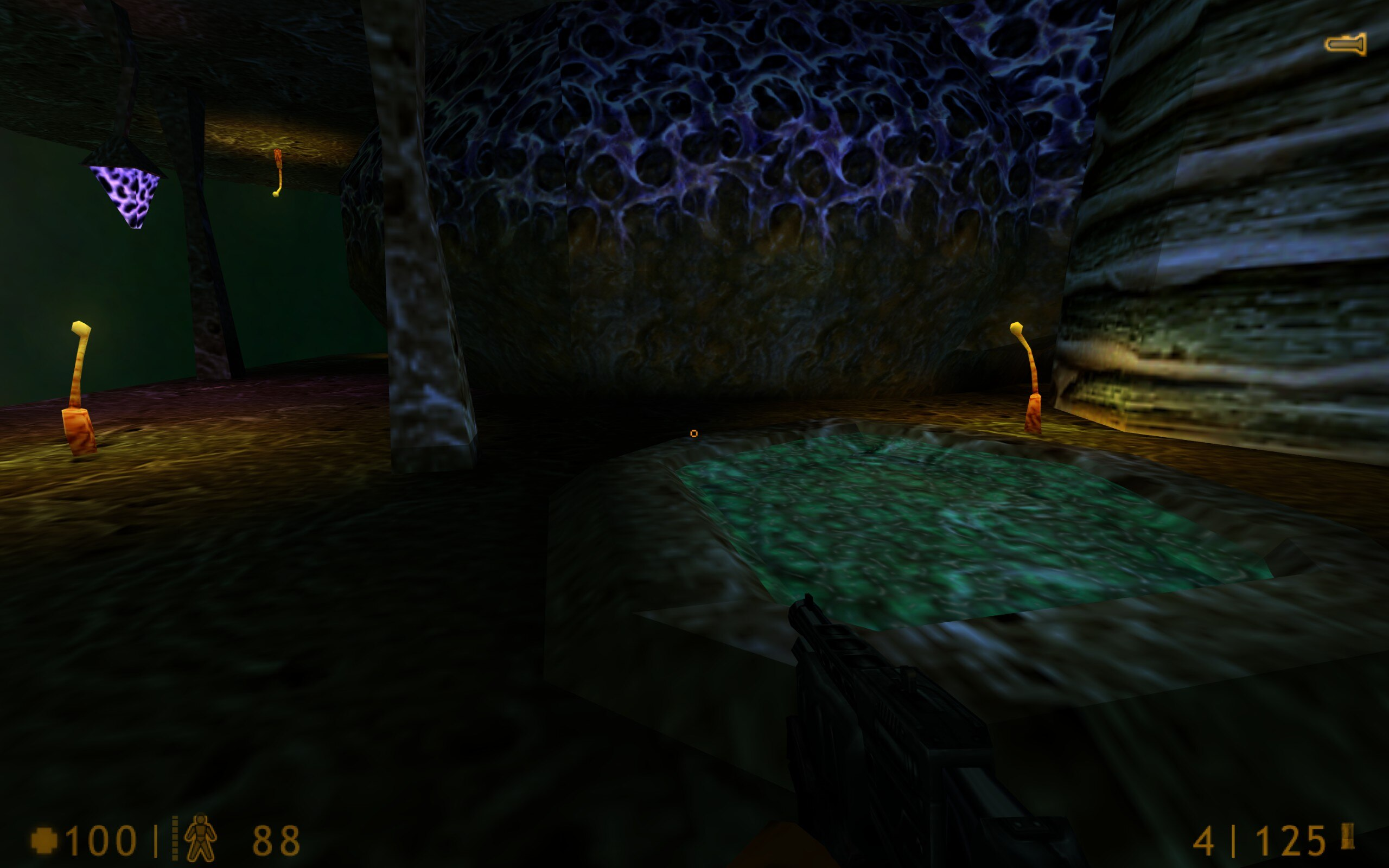 A view from the middle groove area of the main Xen island. Featrued are some glowing plants, some hostile violet crystals, and a blue healing pool.