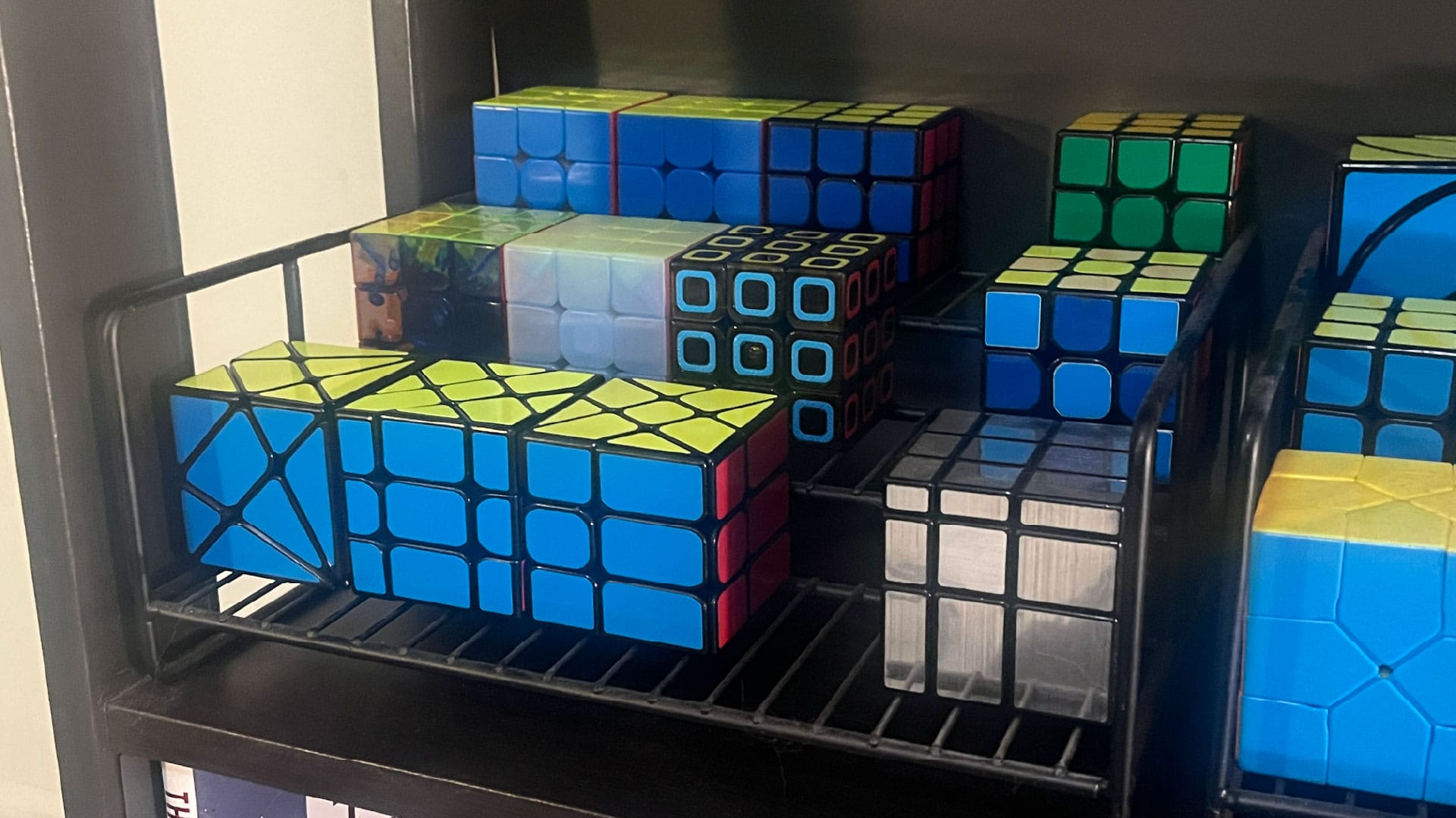 The bottom shelf of my cubeshelf, focused only on the 3x3s.