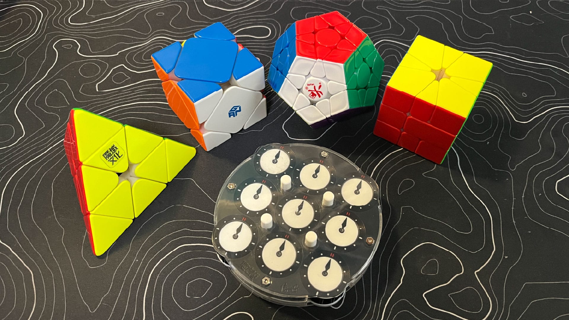 My MoYu WeiLong Pyraminx Magnetic, GAN Skewb M Enhanced, DaYan Megaminx Pro, Angstrom MGC Square-1, and QiYi Magnetic Clock.