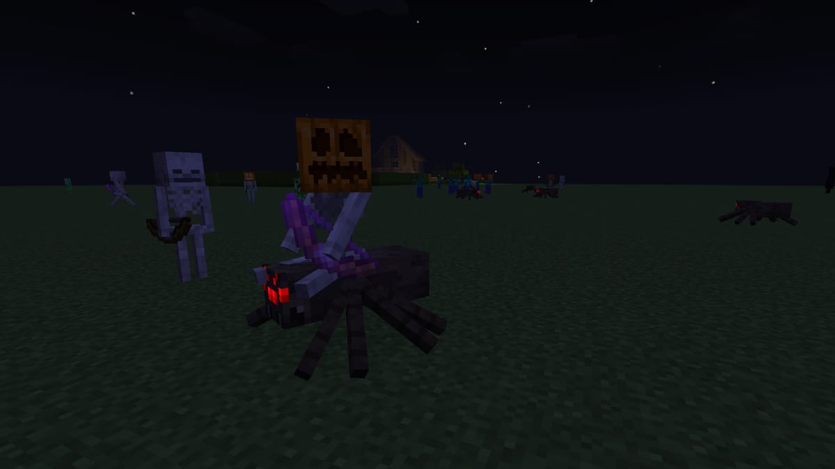 A screenshot from Minecraft, highlighting a Spider Jockey wearing a pumpkin on its head. Other zombies and skeletons are in the background also wearing pumpkins, including one with a Jack O'