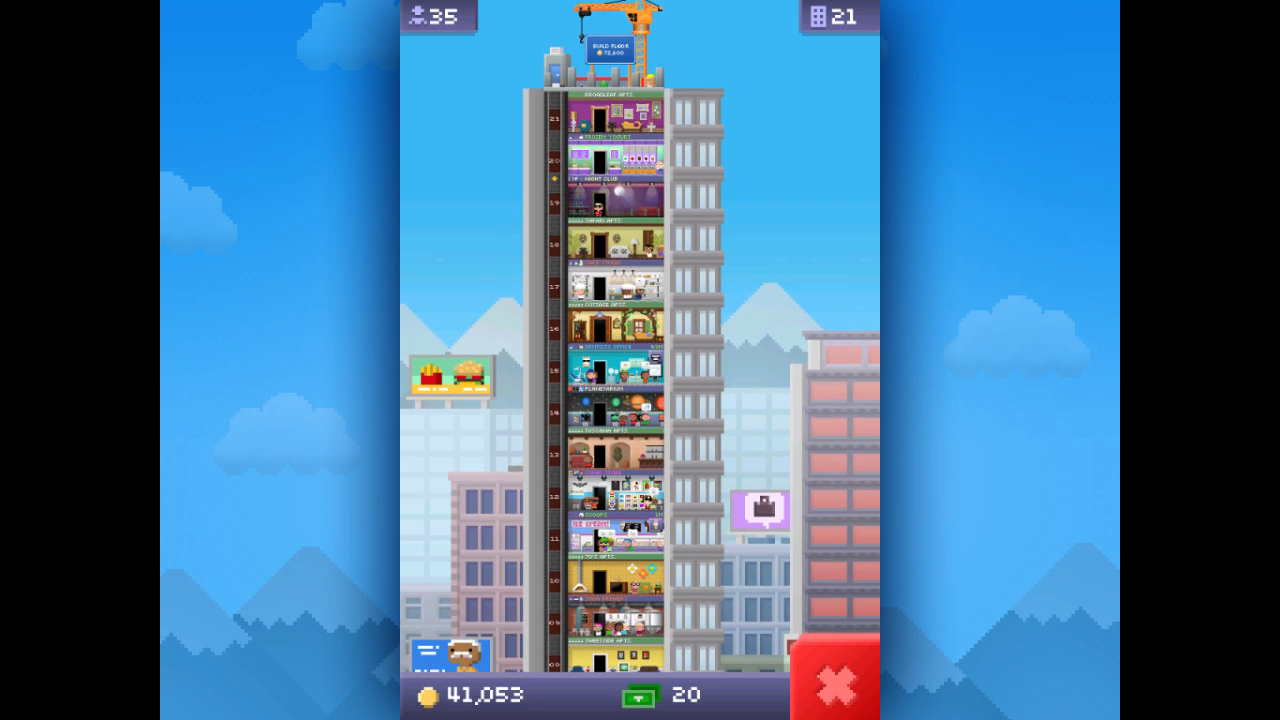 A screenshot of the top of the tower of the Tiny Tower - 2011 iPhone Game of the Year trailer.