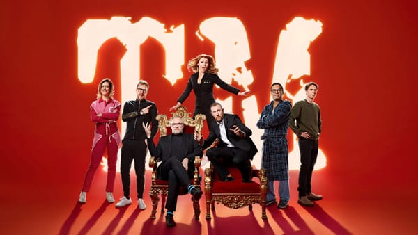 Promotional image for Taskmaster Series 8. Featuring Greg Davies and Alex Horne in their thrones with all five contestants behind them.